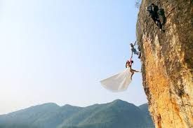 woman in dress on cliff.jpeg